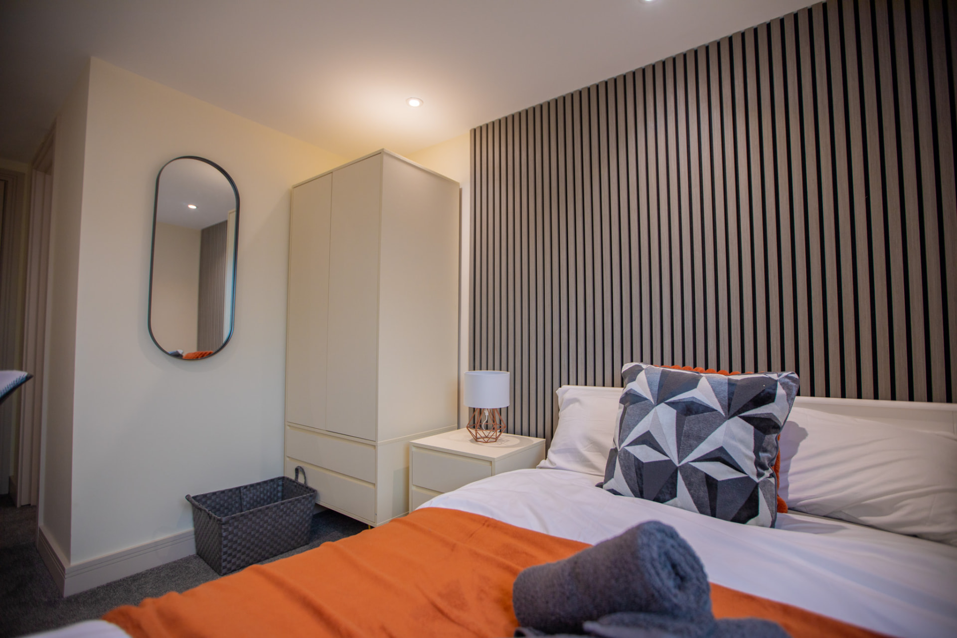 Barton Road after — room with slat feature wall